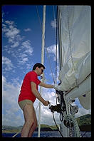 My brother Harry fiddles with the sails on the Diana