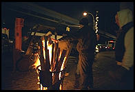 Staying warm around the fire, outside the Fulton Fish Market.  Manhattan 1994 (pre burning).